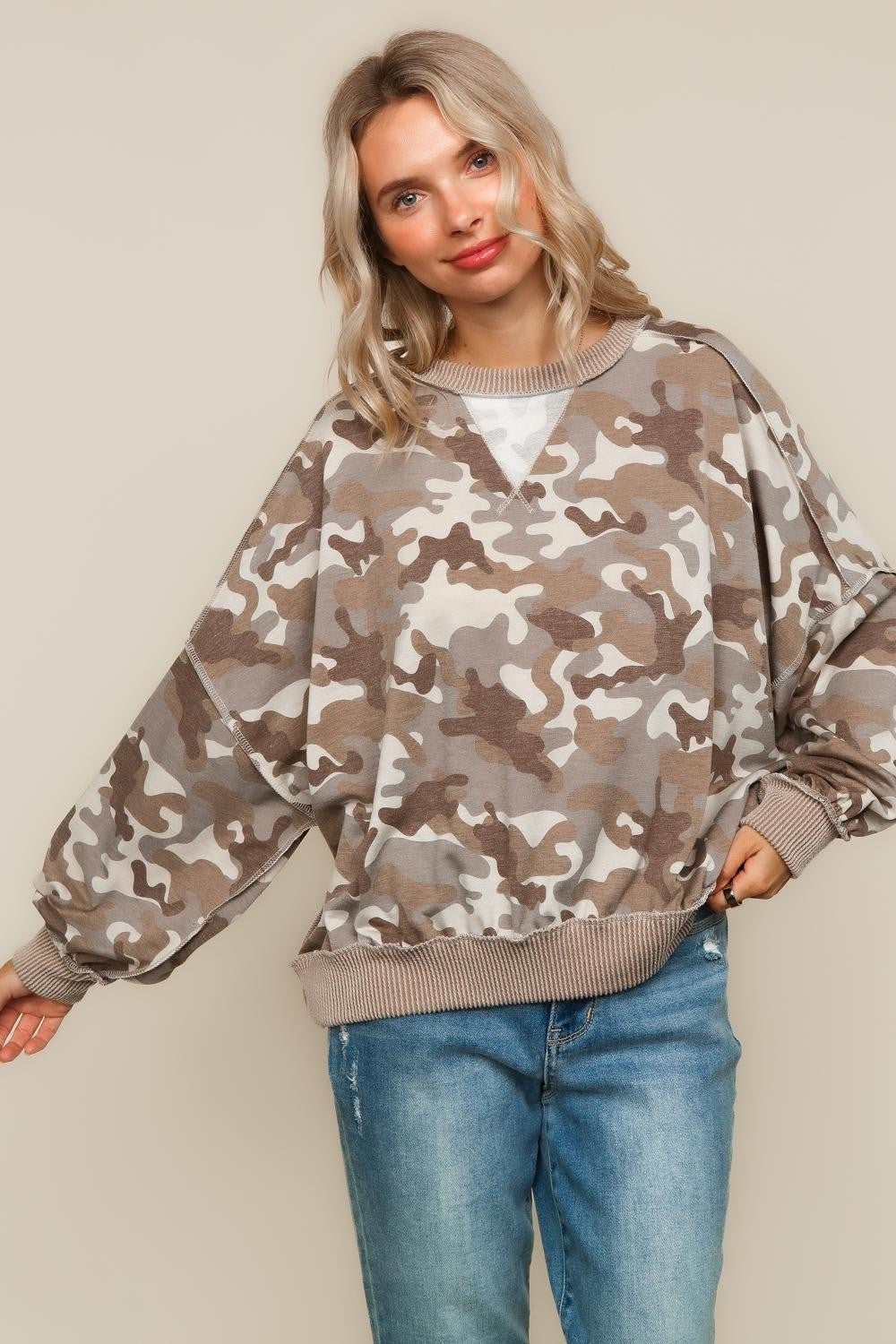 PULLOVER KNIT TOP W/ REVERSE STITCHES DETAIL